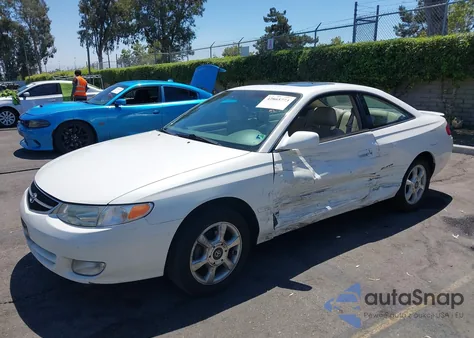 1999 Toyota Camry Solara Sle z USA, uszkodzony, nr VIN 2T1CF22P1XC210933